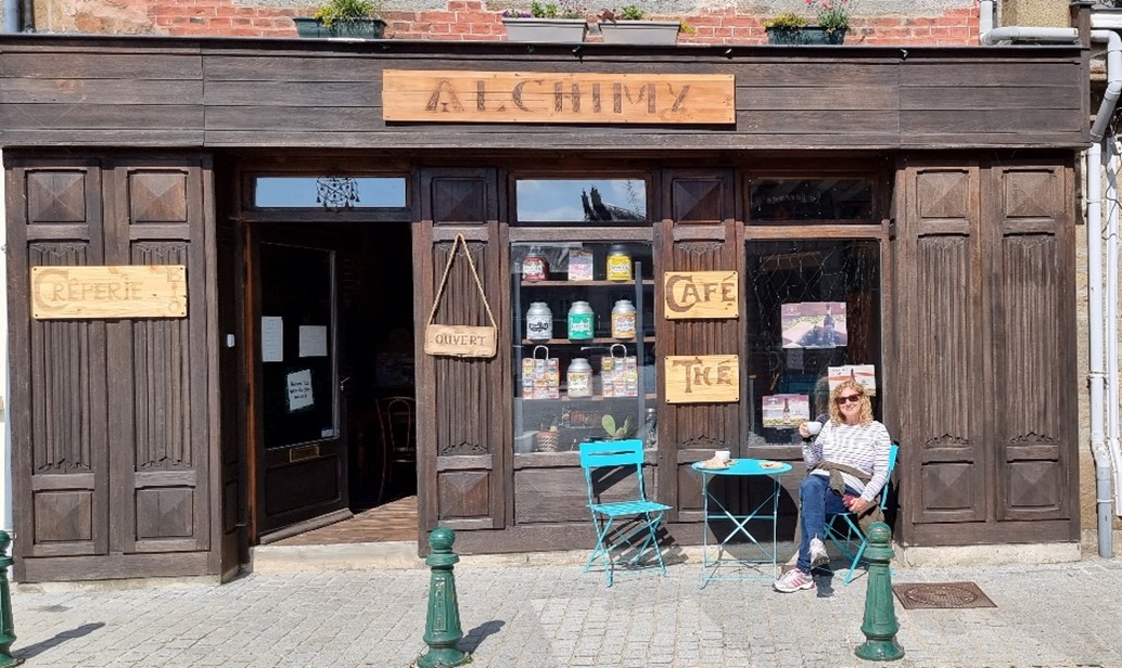 Sue outside cafe in Carrouges